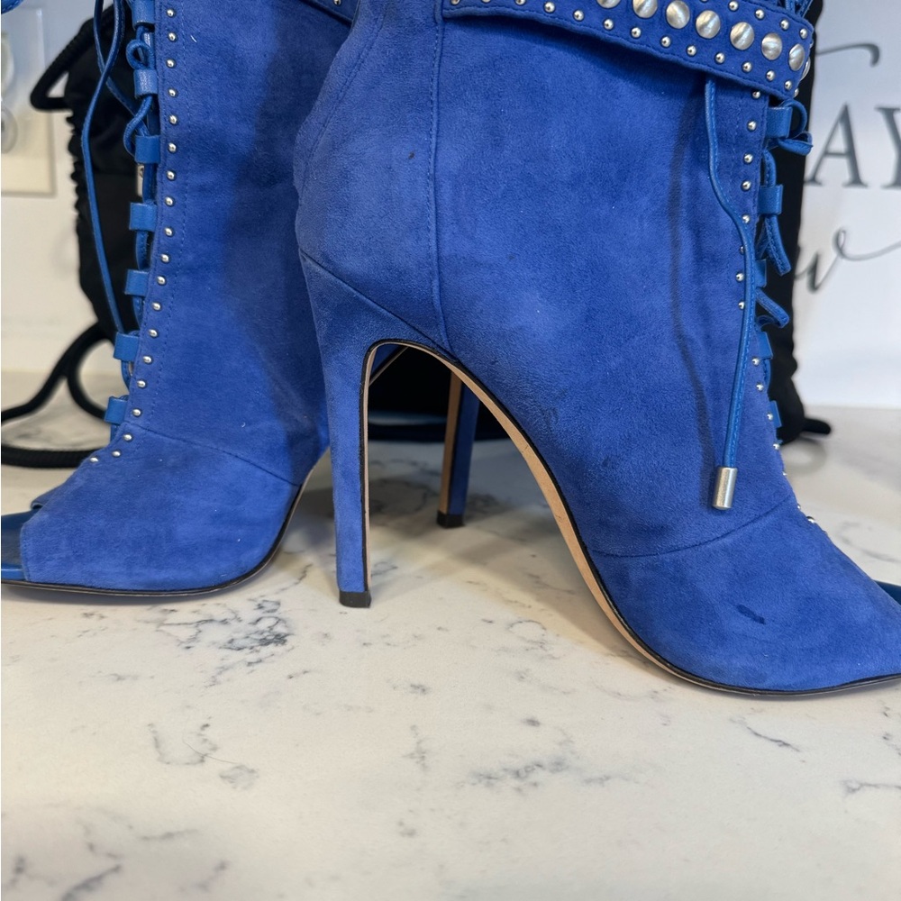 Brian Atwood boots in bright blue color. Real suede and leather.